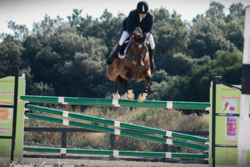 Wes jumping King Arthur in the 1.40m