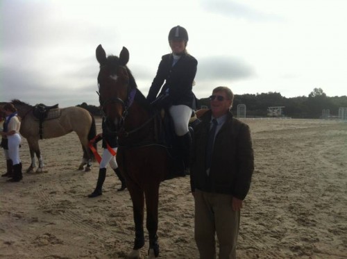 Judge Brian Scattergood smiling and congratulating the pair placing 6th